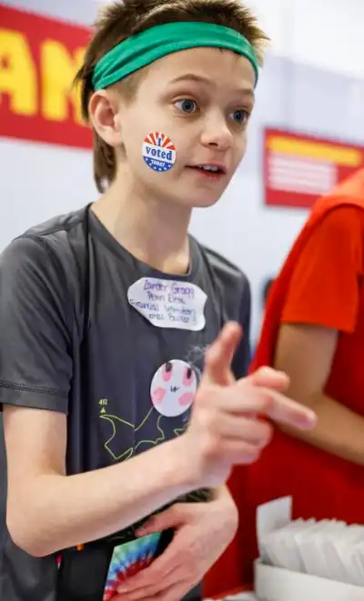 student with gray shirt